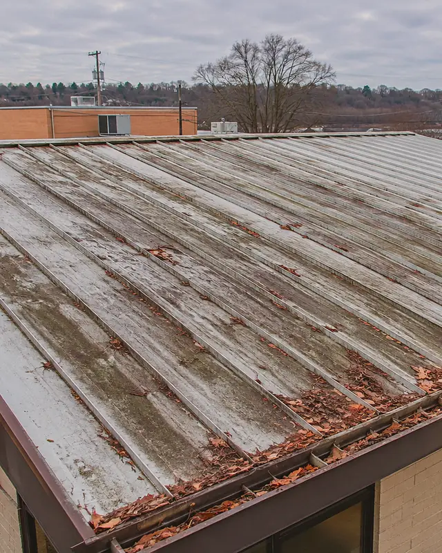 Example, before: a metal roof on a business